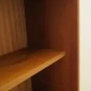 Danish teak veneered bookcase with sliding doors, 1970s