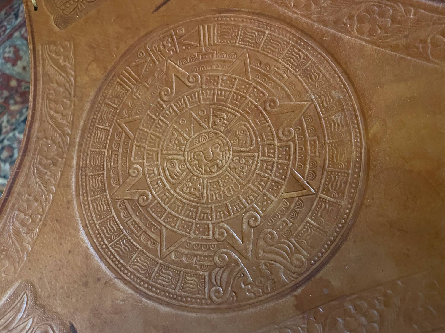 Vintage Mexican tripod stools in bamboo and leather.