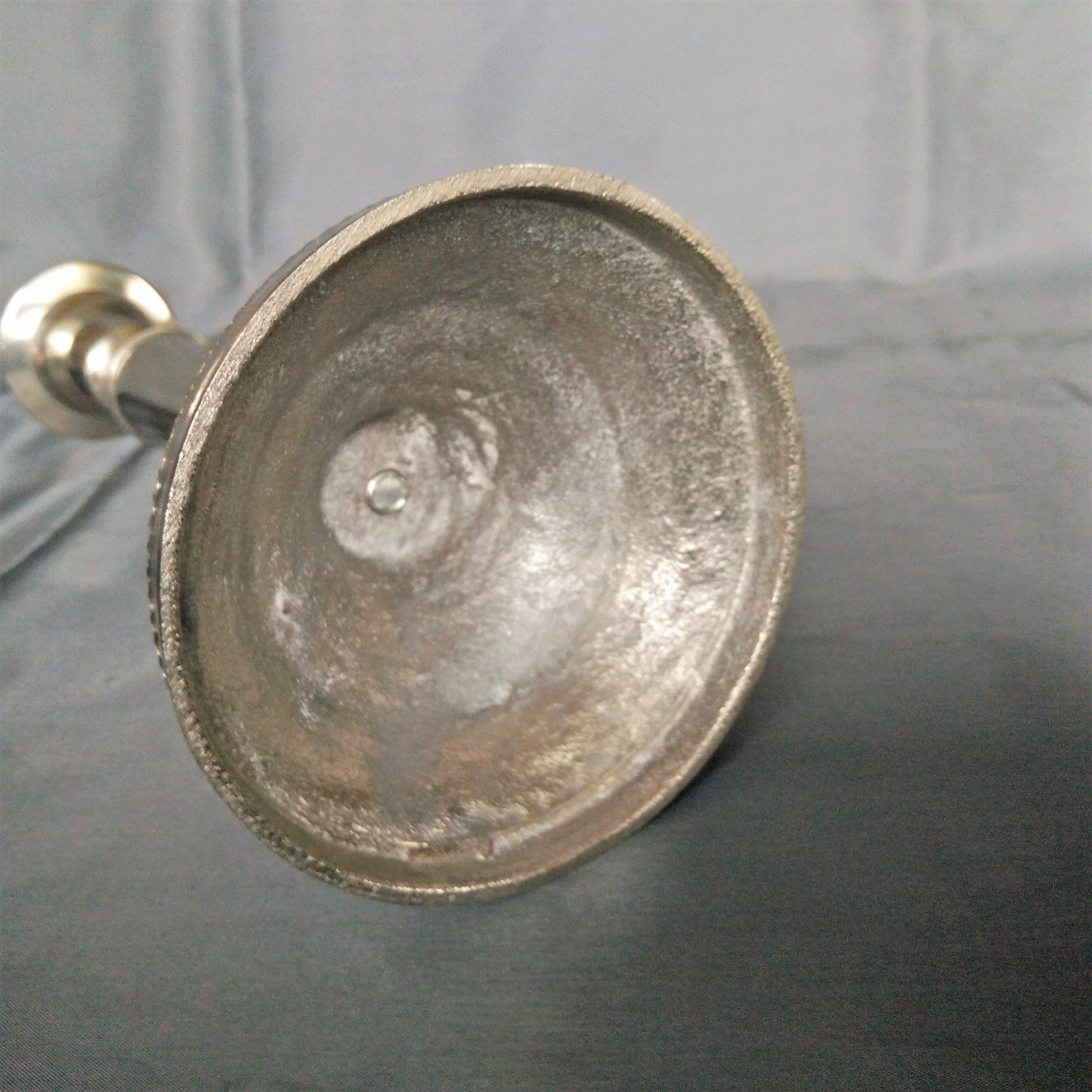 Chromed metal candle holder