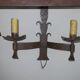 Pair of mid century Brutalist patinated iron wall lights, 1950s-60s