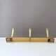 Vintage brass coat rack