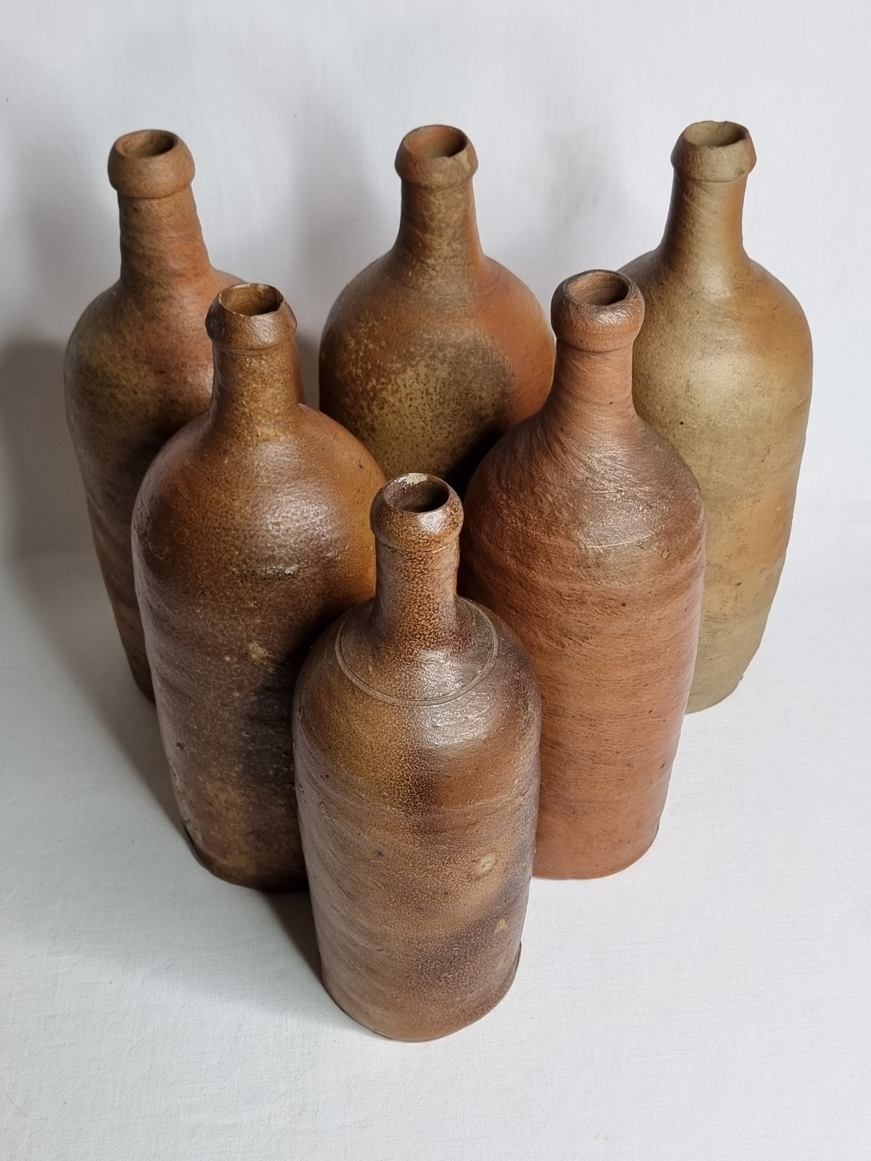 Set of 6 hand-turned stoneware bottles, 31 cm