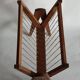 Magazine rack with compass legs in oak and rope, 1950s.