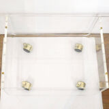 Transparent thermoformed plexi coffee table, on wheels