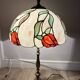 Perenz Tiffany style stained glass table lamp, brass, signed