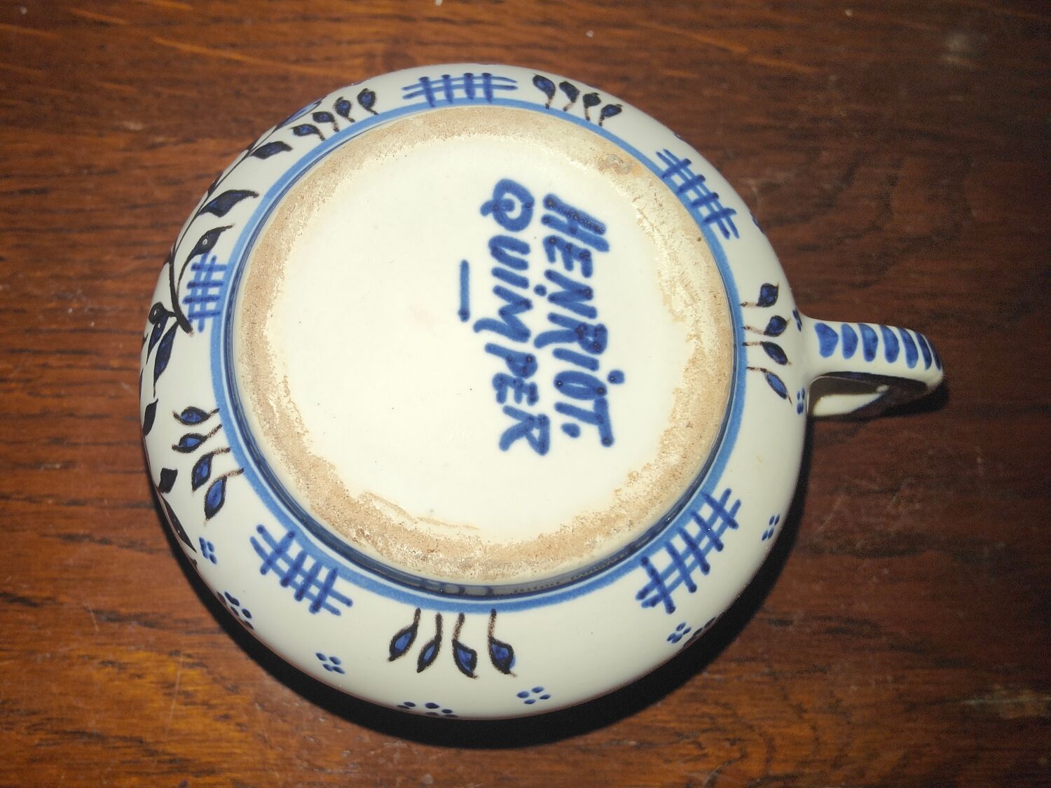 Henriot Quimper earthenware coffee set with floral decoration and elegant blue