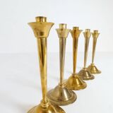 Mid-century set of 5 brass candlesticks by Lars Holmström, Arvika, Sweden.