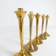 Mid-century set of 5 brass candlesticks by Lars Holmström, Arvika, Sweden.