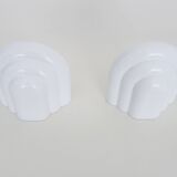 Pair of Art Deco style wall lights in white lacquered metal. 1980s