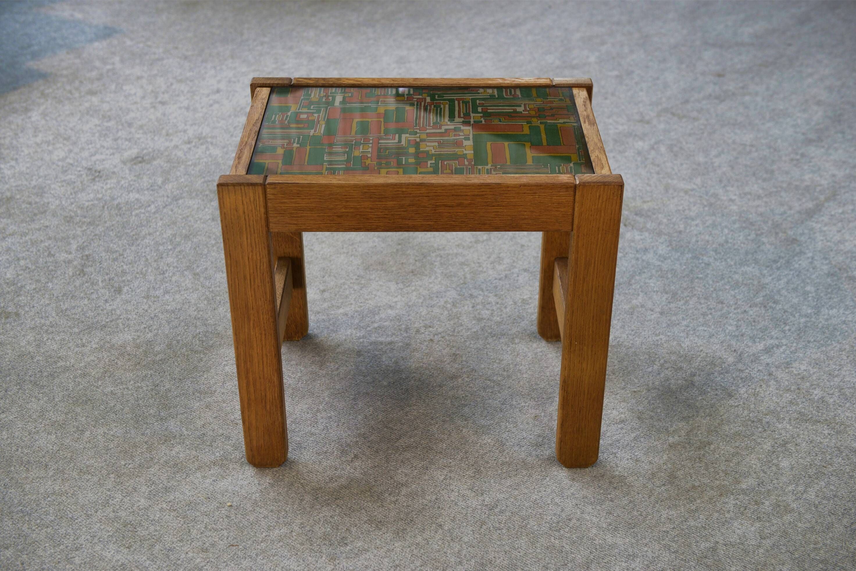 Occasional table in solid oak with a fabric top in the style of Guillerme and Chambron from the 1960s.