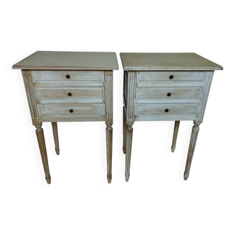 Pair of patinated bedside tables. Three drawers. End tables.