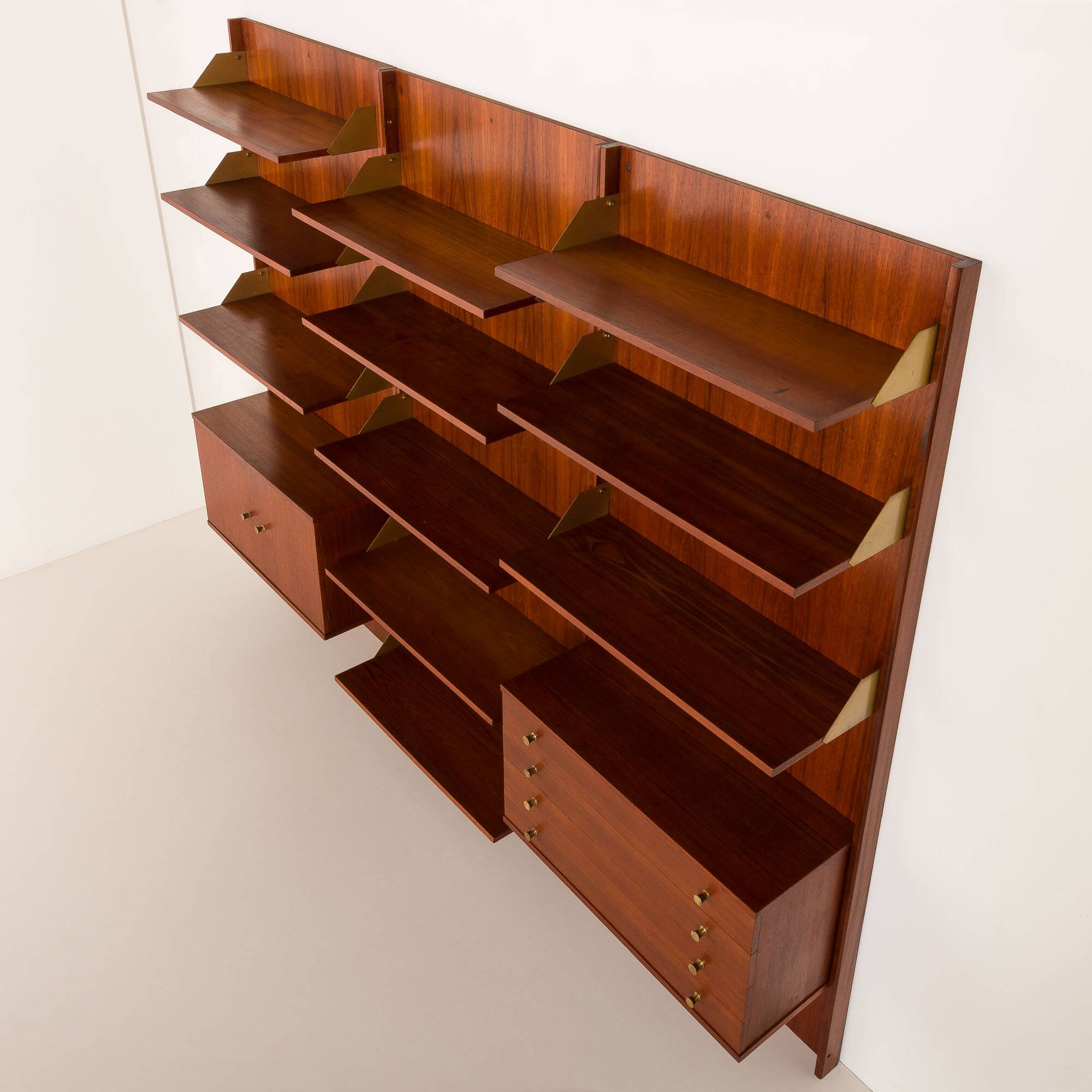 Italian mid-century teak wall unit on panels, 1970s