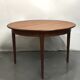 Scandinavian teak dining table with extension cords