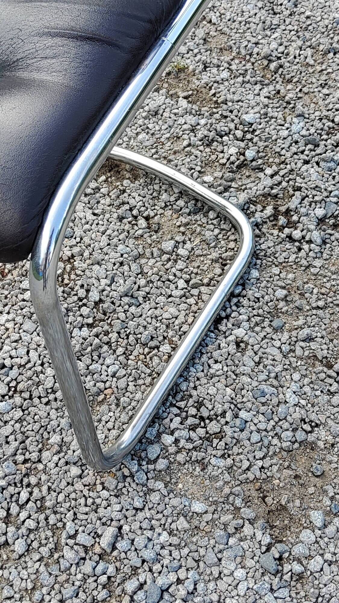Chair from the 70s in chromed metal and brown moleskine