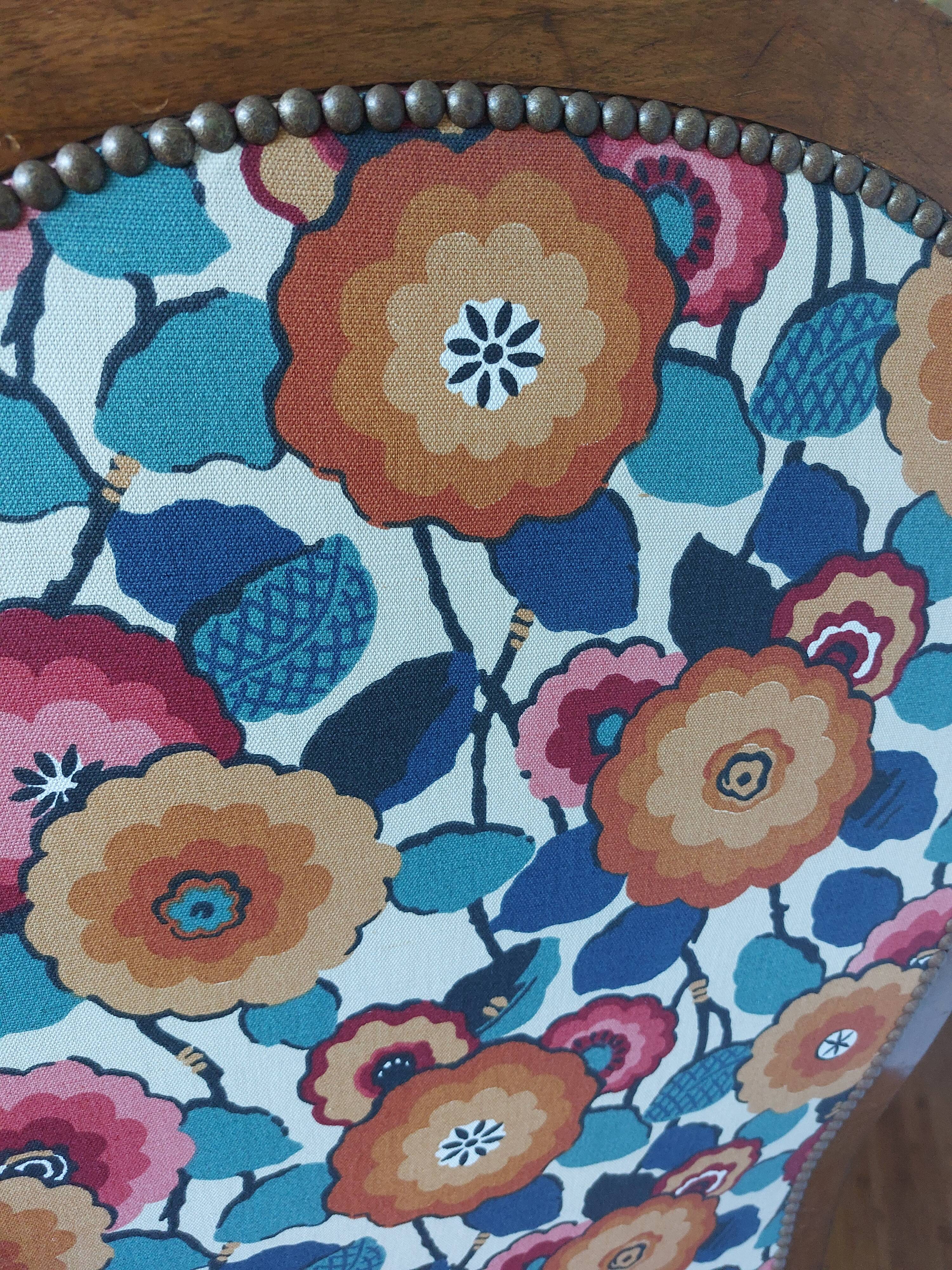 Voltaire armchair with a rack, wheels, and a toad chair in matching fabric.