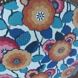 Voltaire armchair with a rack, wheels, and a toad chair in matching fabric.