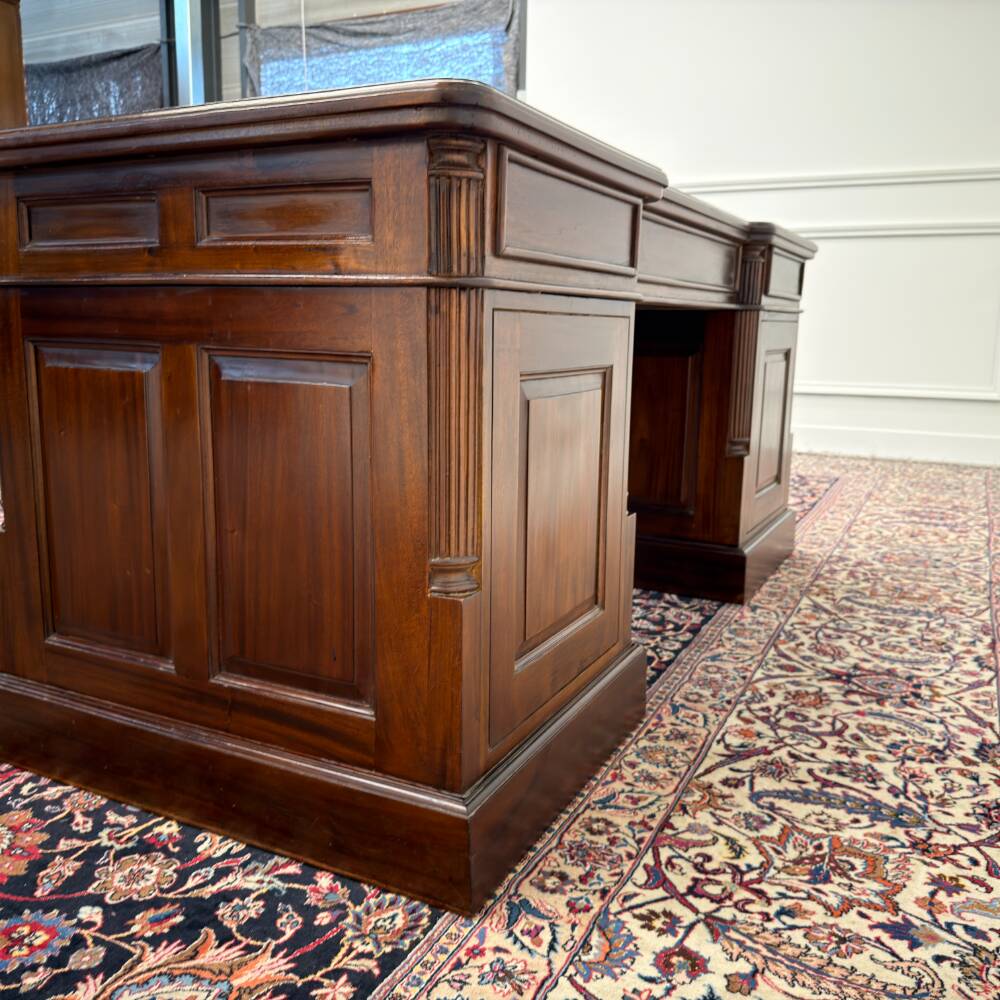Classic English desk with green leather inlay.