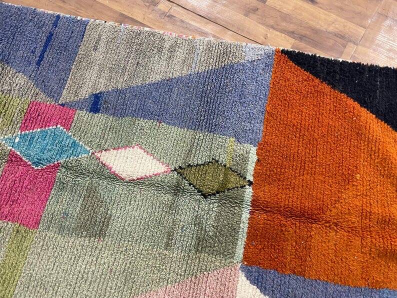 Handmade natural wool rug with colourful patterns 150/250 cm