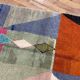 Handmade natural wool rug with colourful patterns 150/250 cm