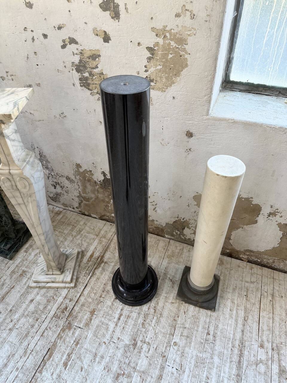 Set of 4 marble columns or pedestals.