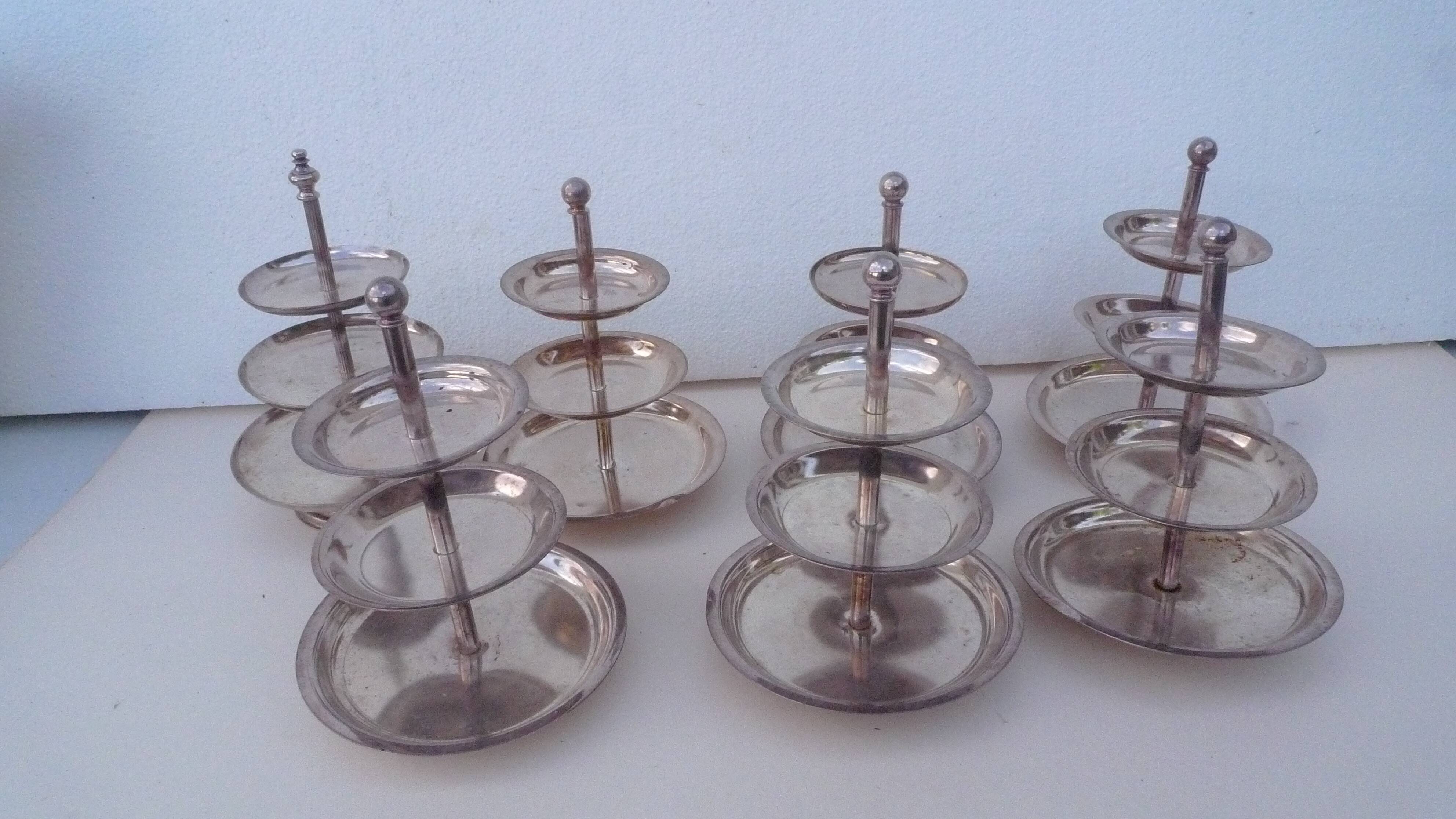Set of 10 three-tiered serving trays.