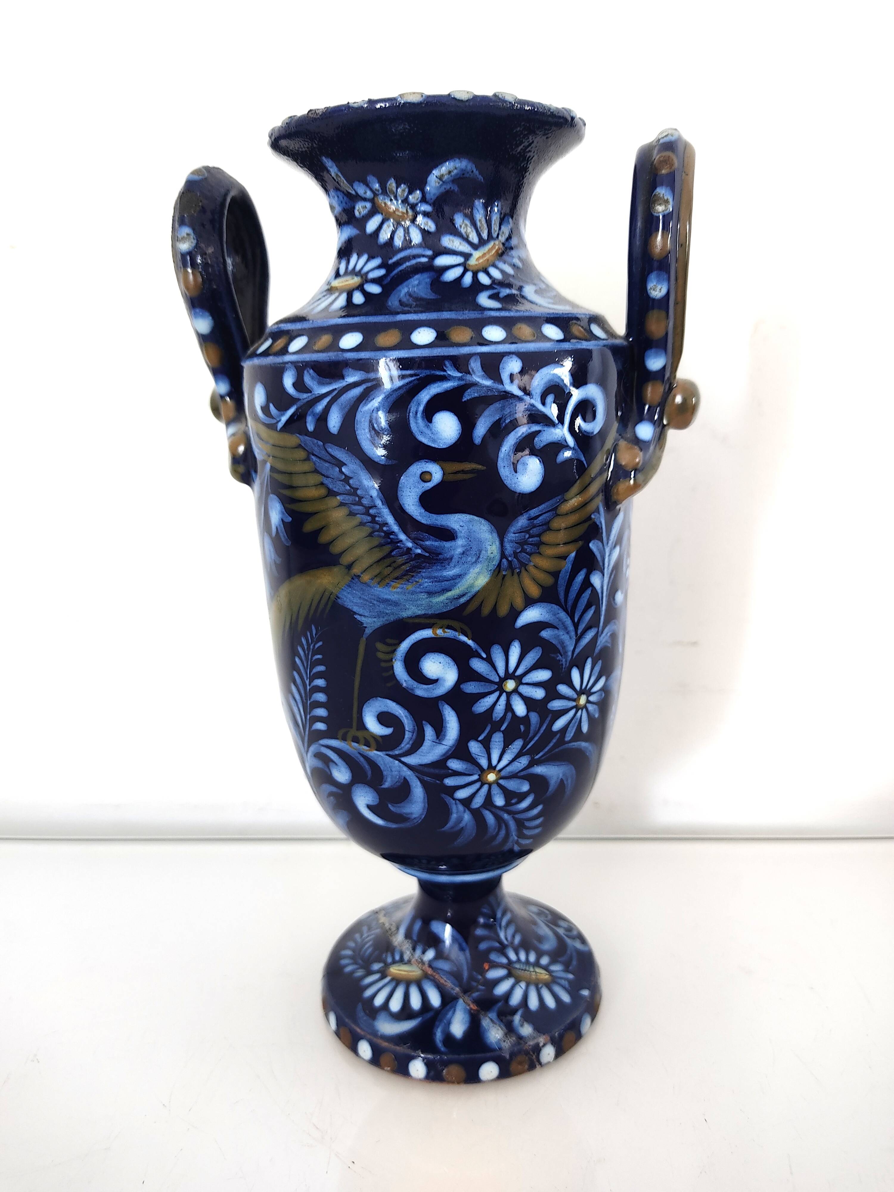 Small blue vase with birds
