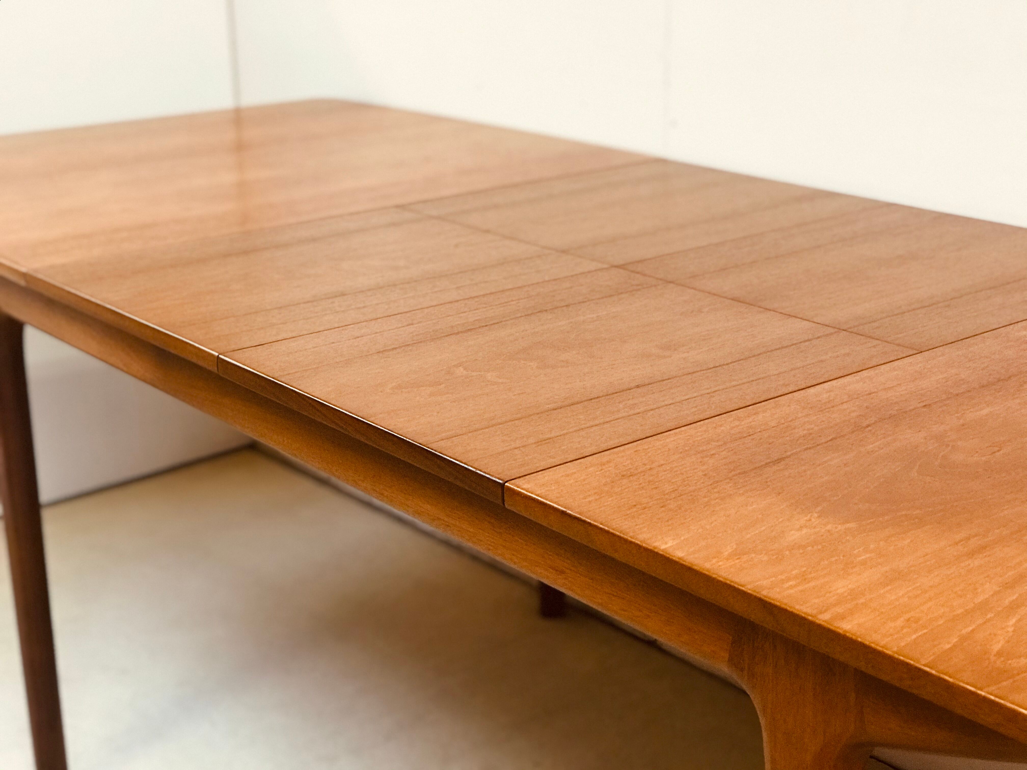 McIntosh extending teak table designed by Tom Robertson 60’s