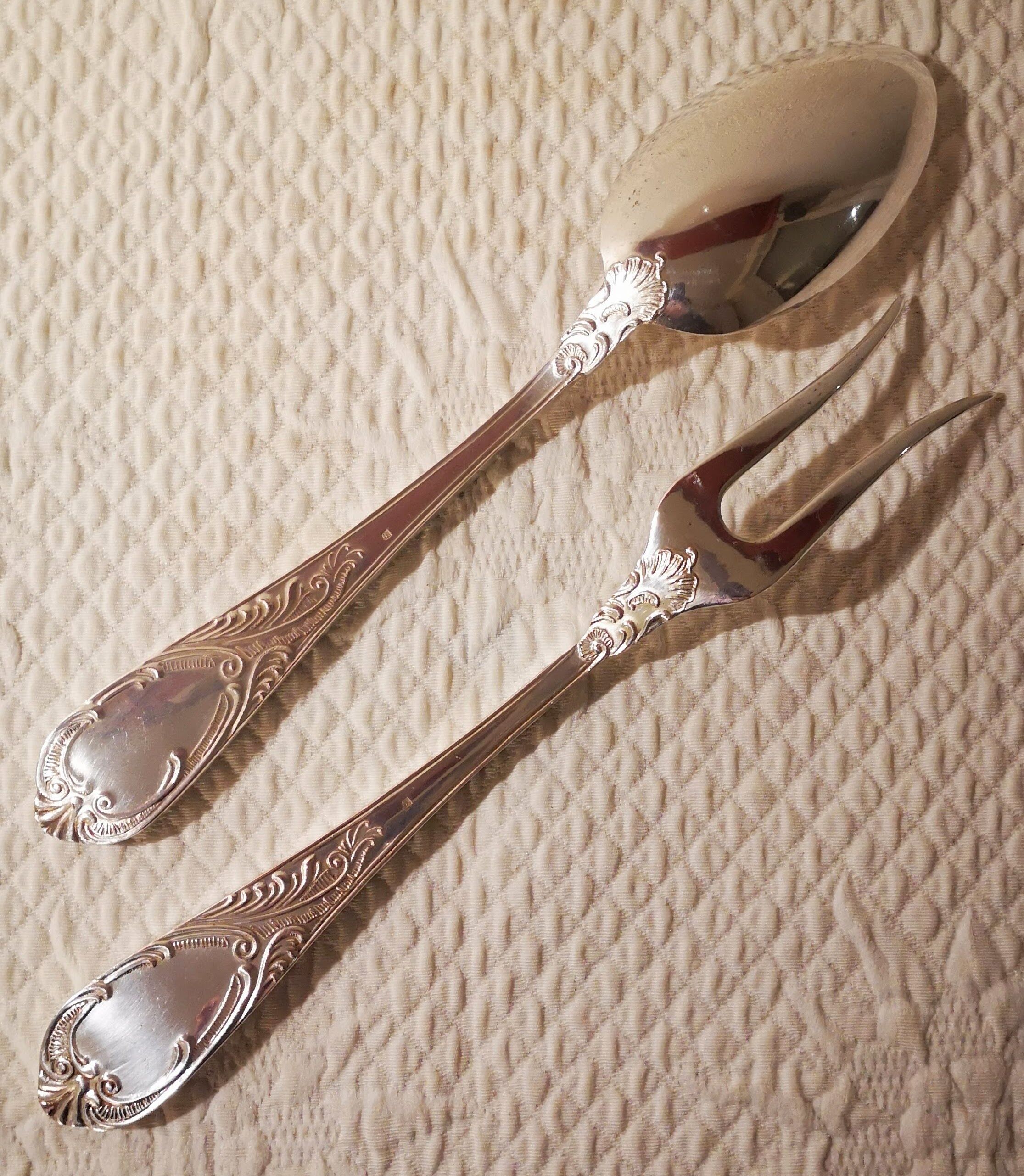 Silver metal service cutlery