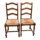2 dining chairs in solid wood and rush, Chippendale ladder style.