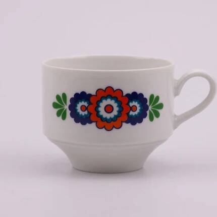 7 white porcelain cups from Winterling with coloured patterns.
