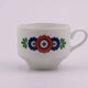 7 white porcelain cups from Winterling with coloured patterns.