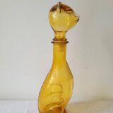 Zoomorphic carafe in amber glass