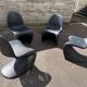 Set of 4 black Verner Panton Vitra chairs.