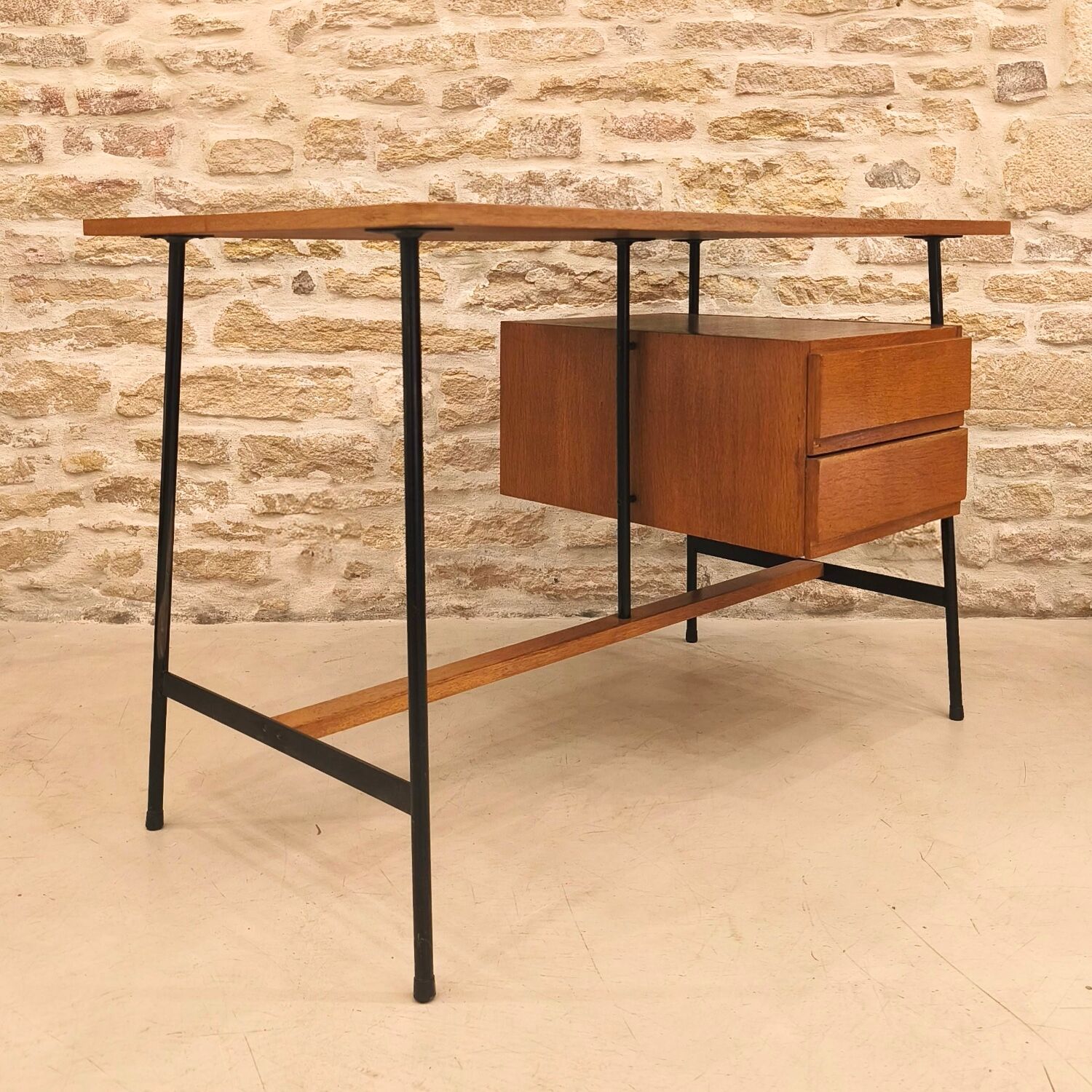 Modernist desk with suspended drawer unit, French work from the 1950s.