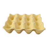 Vintage yellow ceramic egg holder