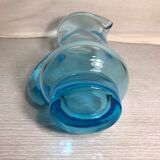 Old blue blown glass pitcher with vintage handle