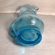 Old blue blown glass pitcher with vintage handle