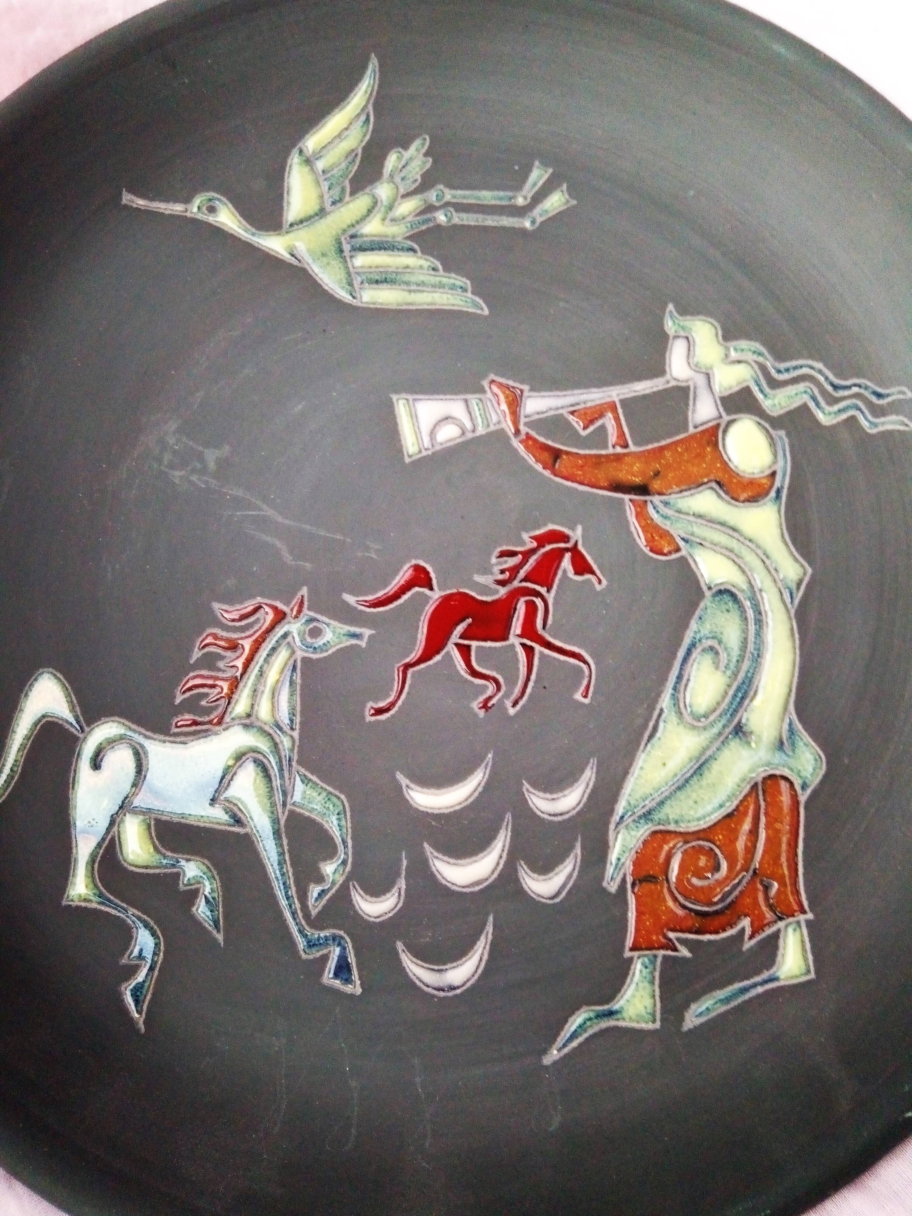 Rare pair of ceramic plates and enamel with mythological decoration. The 50s.