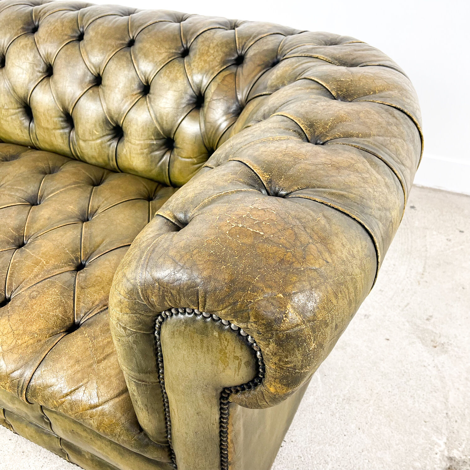 Old vintage leather chesterfield sofa