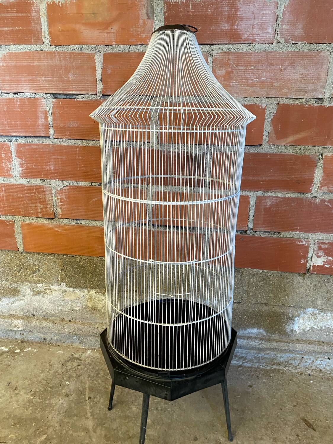 Antique black & white metal bird cage on vintage decorative legs