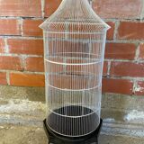 Antique black & white metal bird cage on vintage decorative legs