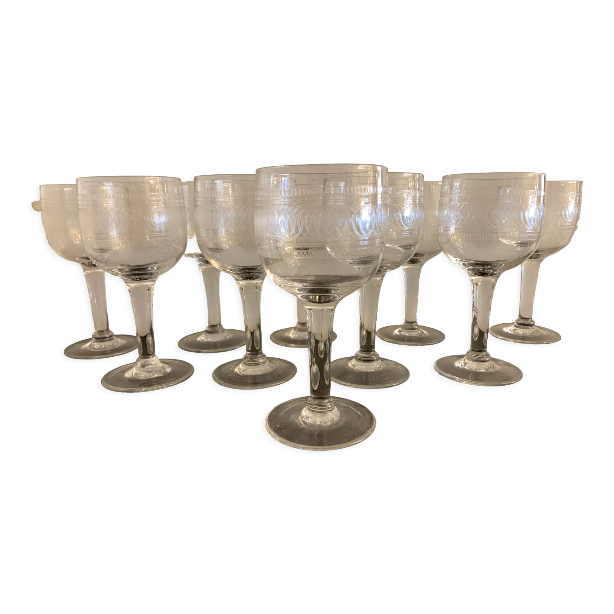 10 blown and engraved stemmed glasses