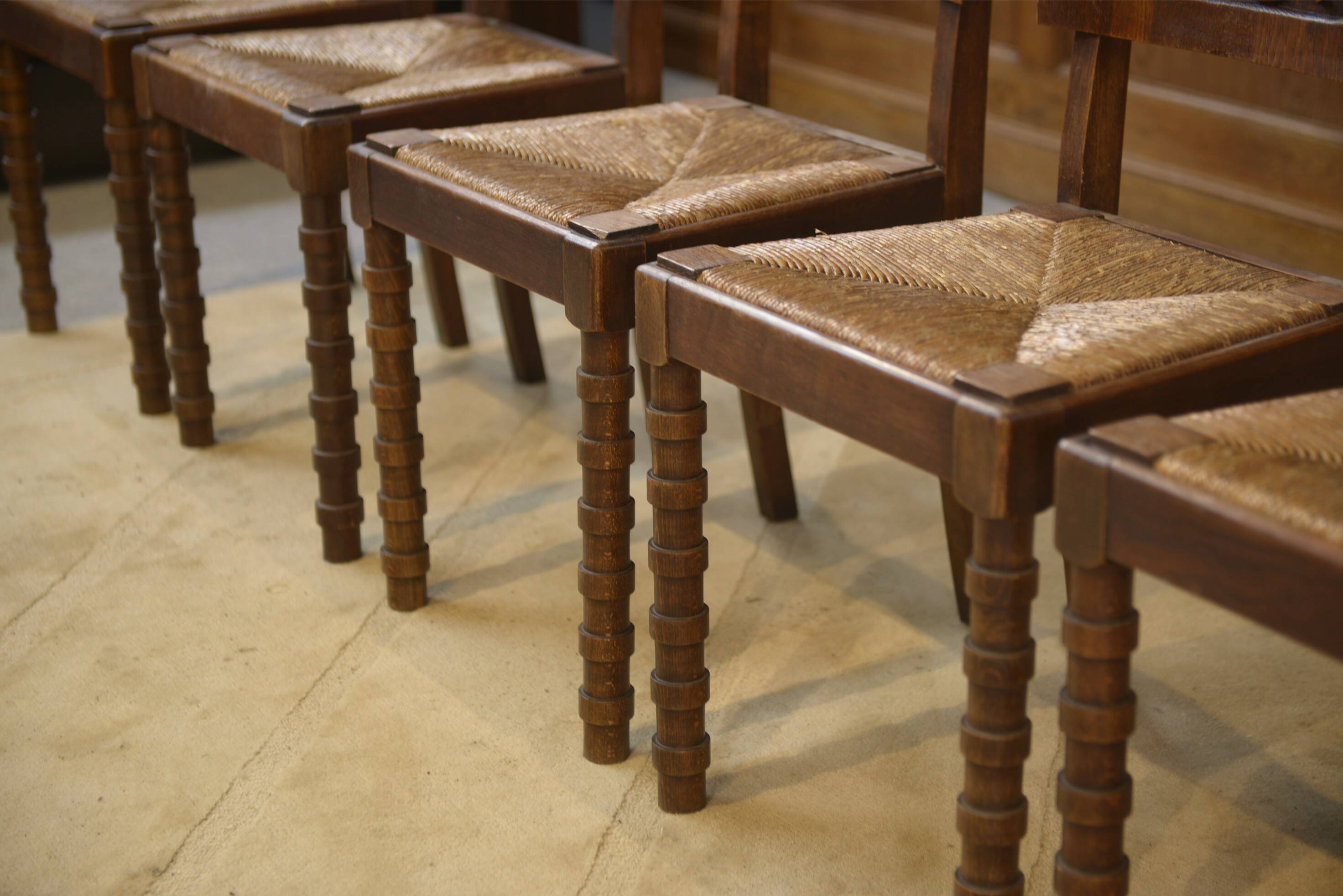 Ensemble de 6 chaises Charles Dudouyt en chêne 1950’s