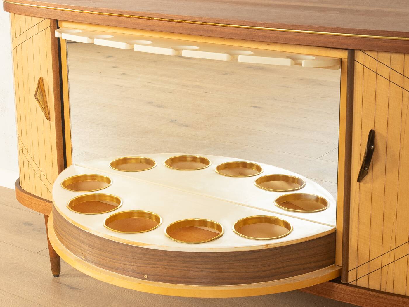 Elegant bar cabinet from the 1950s with rotating compartment and mirrored back