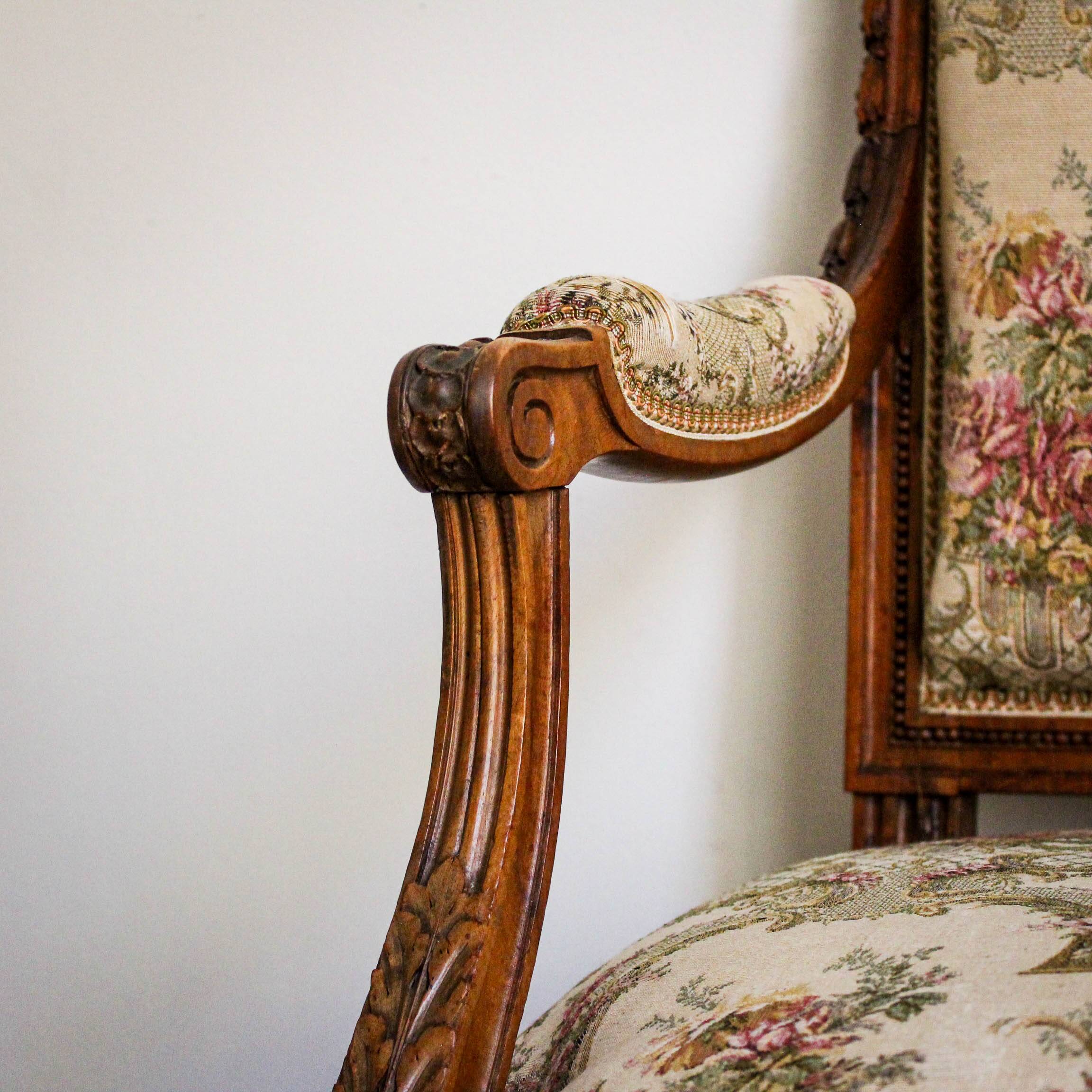 Louis XVI style carved armchair