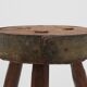 Brutalist French solid oak tripod stool with metal rim, 1850s