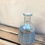 Vintage carafe with vichy black and white tiles