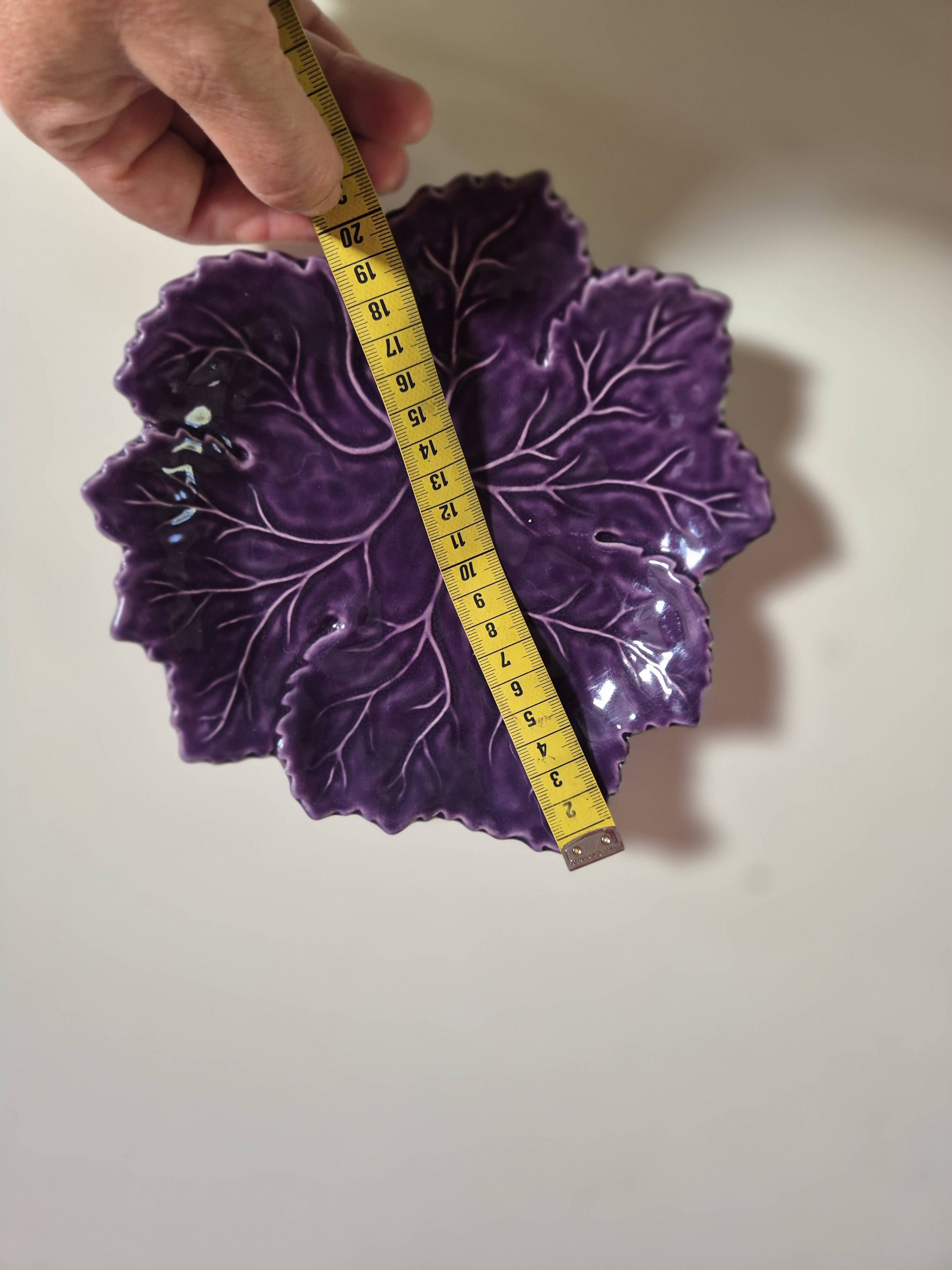 purple ceramic bowl in the shape of a tree leaf