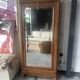Antique Louis-Philippe walnut veneered wardrobe with an antique mirror.