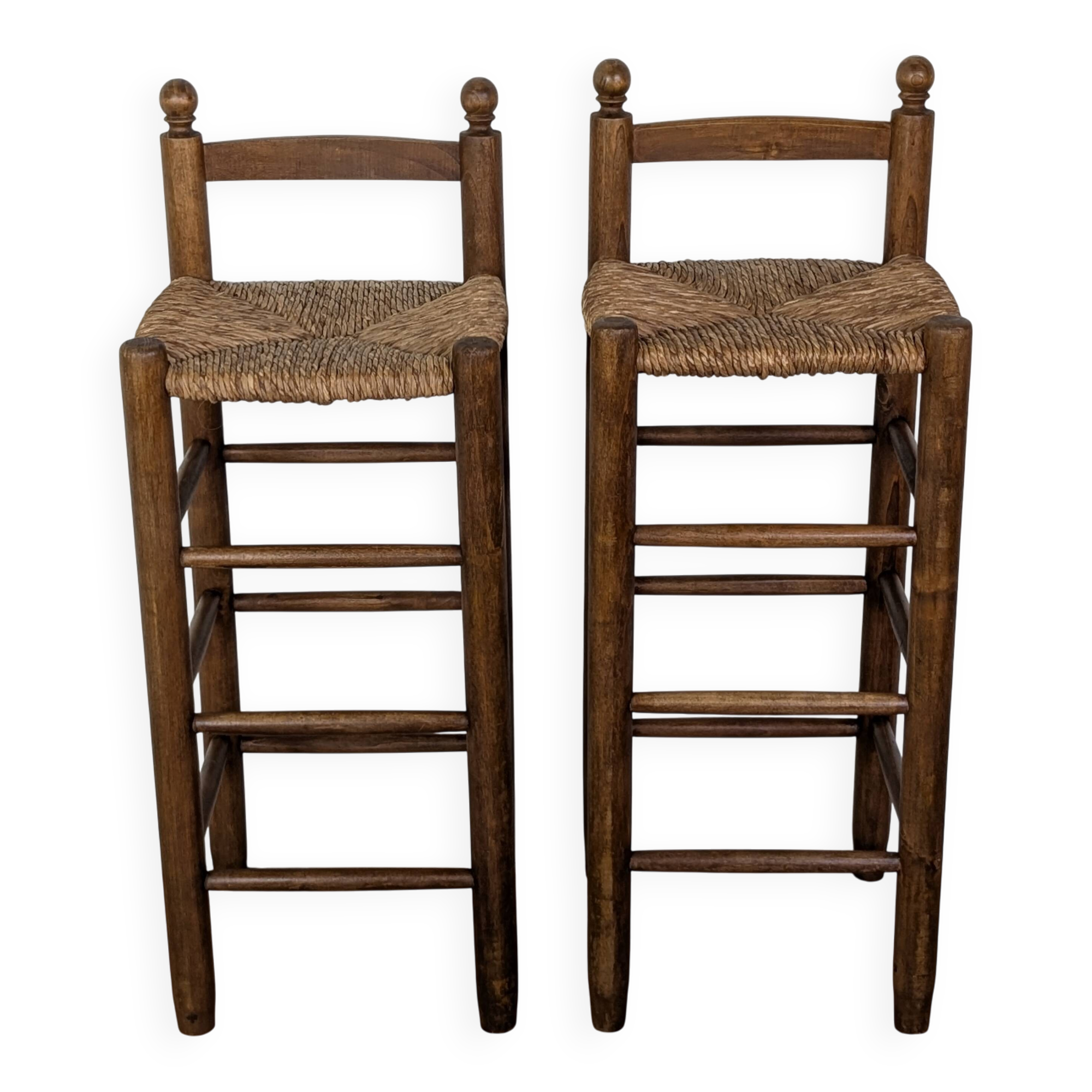 High wooden and straw stools